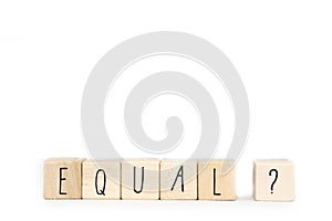 Wooden cube with a question mark and the word Equal  on white background, Symbol for gender equality and social photo