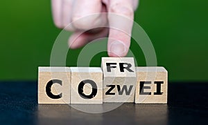 Wooden cubes form the German expression 'CO zwei frei' (CO2 free.