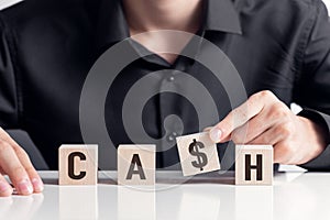 Wooden cubes with the inscription - CASH. Business and economy concept, cash is not tresh