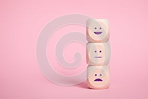 Wooden Cubes smilies faces symbols on Pink, Customer experience rating