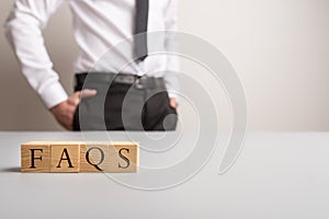 Wooden cubes spelling FAQS