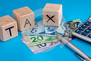 Wooden cubes tax with canadian dollar