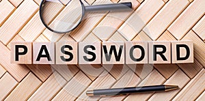 Wooden cubes with the word PASSWORD stand on a wooden background between a magnifying glass and a pen