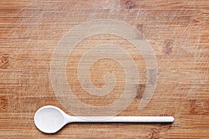 Wooden cutlery on cutting board