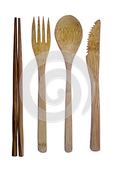 Wooden cutlery set isolated on a white background, consisting of a spoon, fork, Dinner Knife and chopsticks.