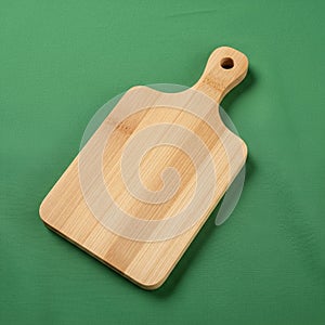 Wooden cutting board with a handle featuring a rectangular shape and rounded