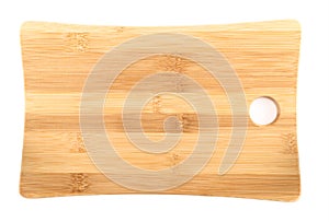 Wooden cutting board over white background