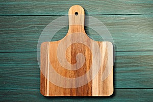 Wooden cutting board, tray on table