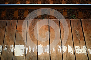 Wooden dais on railroad station backdrop