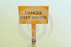 Wooden DANGER DEEP WATER sign