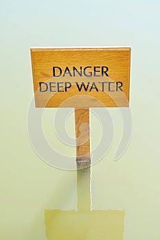 Wooden DANGER DEEP WATER sign