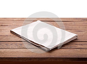 Wooden deck table with white napkin isolated on white. Kitchen background, product montage display. Mock up.