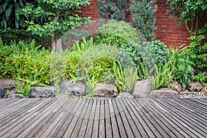 Wooden decking and plant with wall garden decorative photo