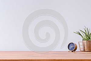 Wooden desk and empty wall photo