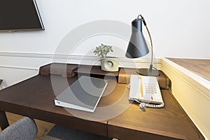 Wooden desk prepared to work