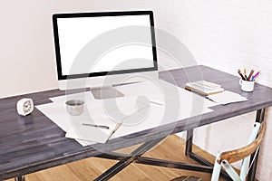 Wooden desktop with white screen