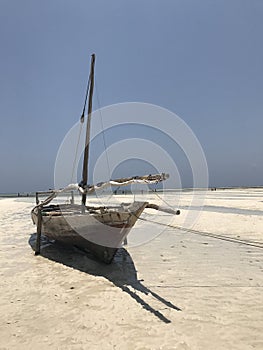 A wooden dhow on the beaches of Zanzibar