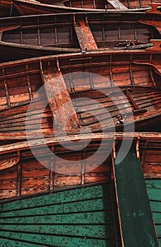 Wooden dinghy rowboat on lake