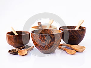 Wooden dining set with cup, bowl and spoon, utensil for eating isolated on white background