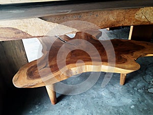 wooden dining table that appears to be in the display room at a home knick-knack