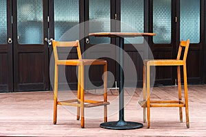 Wooden dining table and chair in restaurant