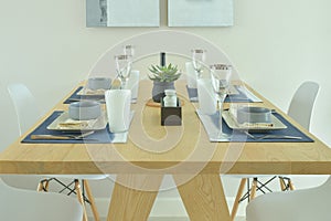 Wooden dining table with dining set in modern style