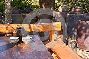 Wooden dining table and stools in traditional Chinese village