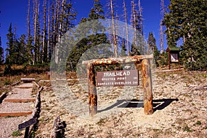 Wooden direction sign on the Spectra Point and Ramparts Overlook trail in Utah, USA