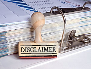 Wooden disclaimer stamp and binder