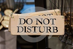 Wooden Do Not Disturb Sign Black Text Printed Decoration Hanging photo