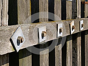 Wooden dock breakwall in a marina harbour