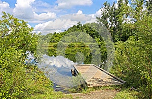 A wooden dock on a lake