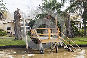 Wooden dock seen from boat in the Delta del Parana, Tigre Buenos Aires Argentina