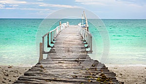 Wooden dock in Thailand seaside tropical paradise