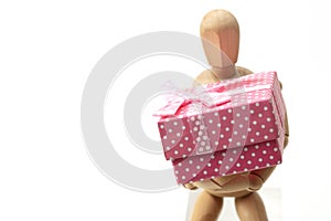 Wooden doll for drawing holding big gift box