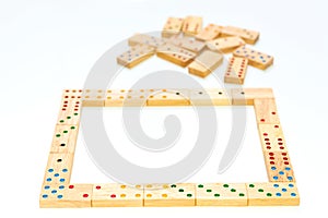 Wooden domino game on white