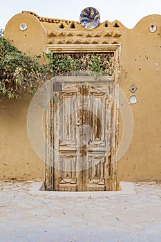 Wooden door on a building in the village of Faiyum