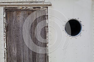 Wooden door with cirlce window. Old Texture With Natural Pattern