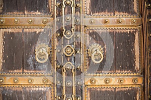 Wooden Door with Doorknockers