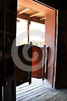 Wooden door of a far west saloon