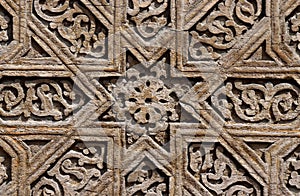 Wooden door floral pattern details of medieval Karakhanid`s tomb in Uzgen,Osh Region, Kyrgyzstan,unesco heritage site