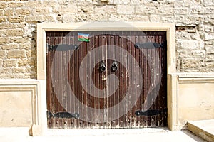 Wooden door with iron handles