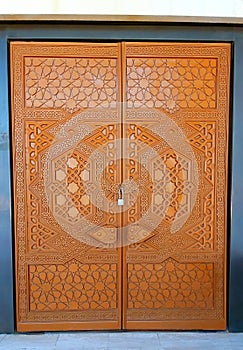 Wooden door with islamic geometry lines on it