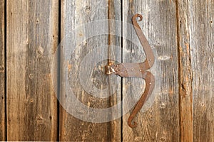 Wooden door made of barn wood with rustic vintage handle