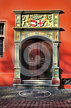 Wooden door of Old Town Hall in Freiburg im Breisgau, Germany