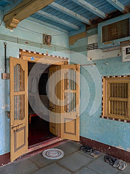 Wooden Door Pillar beam at veranda or verandah of Old House at Kukadia near Idar Sabarkantha North Gujara