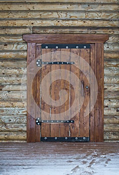 Wooden door of traditional beam country house