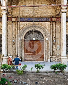 Wooden door and white marble decorated wall, side entrance of Muhammad Ali Mosque, Citadel of Cairo