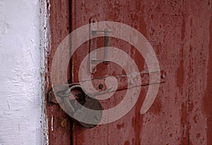 Wooden doors locked padlock