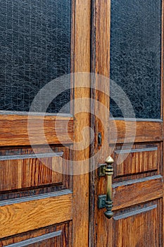 Details of classic architecture building entrance. Doorknob closeup